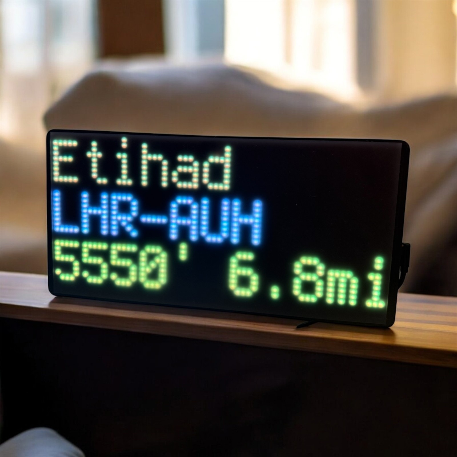 NearestPlane live LED flight tracker display showing Etihad flight details